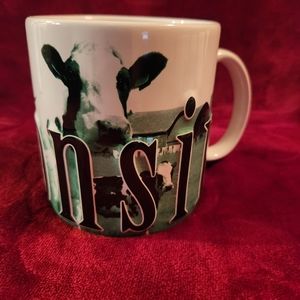 Wisconsin 3D mug is beautifully decorated with two-color graphic images .
